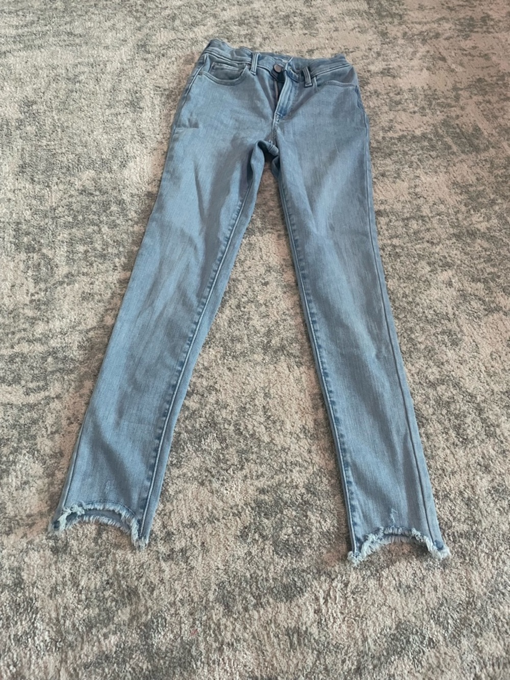 Old Navy Light Blue Skinny Rockstar Jeggins with Frayed Hem and adjustable waist